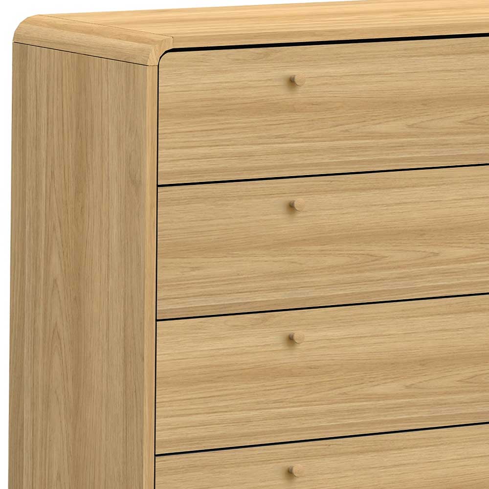 Detail der abgerundeten Kanten und der hölzernen Griffe an der Schubladenkommode – Sophiea