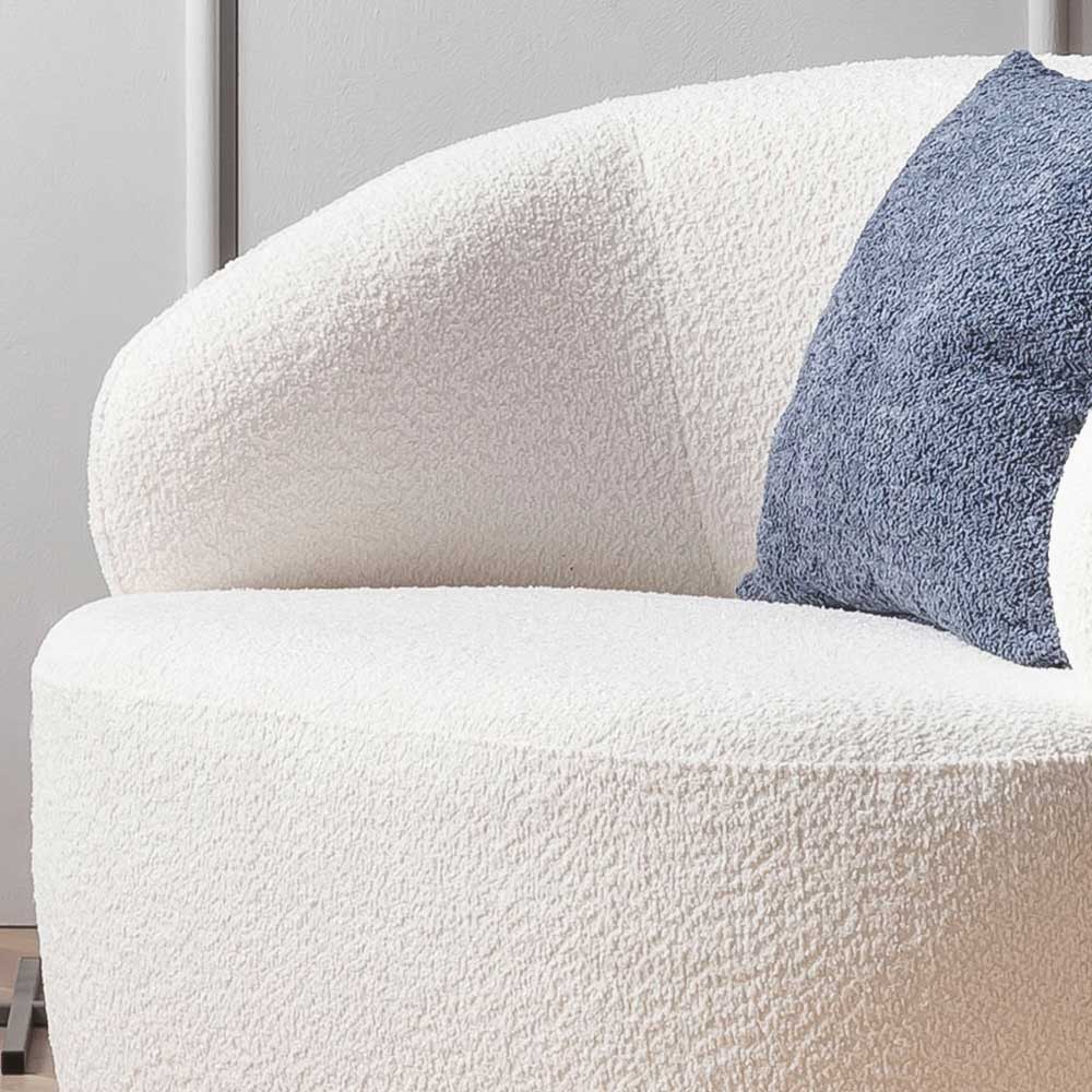 Runder Polstersessel in Bouclé-Optik mit weicher Textur und geschwungenem Design – Zenya