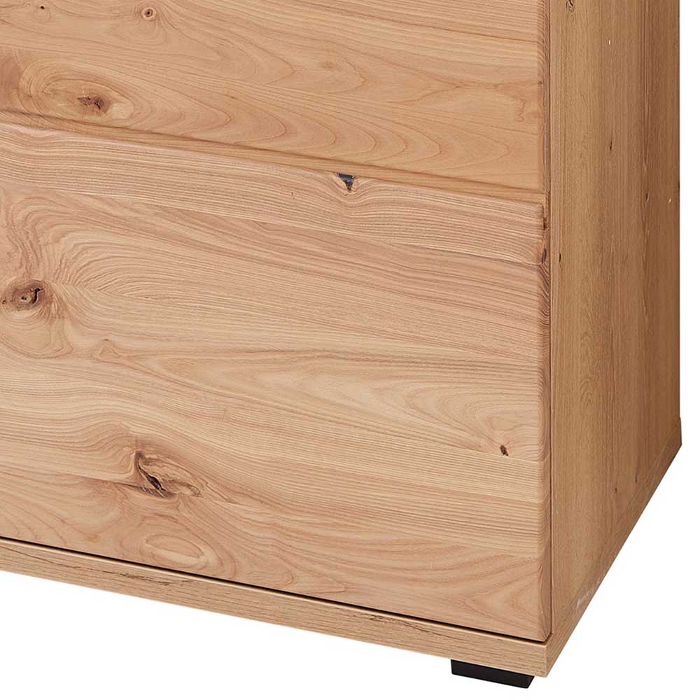 Seitenansicht des Korpus der teilmassiven Kommode mit sichtbarer Holzmaserung und Standfuß – Latenda