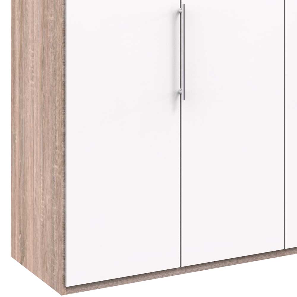 Detailansicht des Falttürenschranks mit heller Holzoptik und glänzender weißer Türfront inklusive Metallgriff – Vaclyn